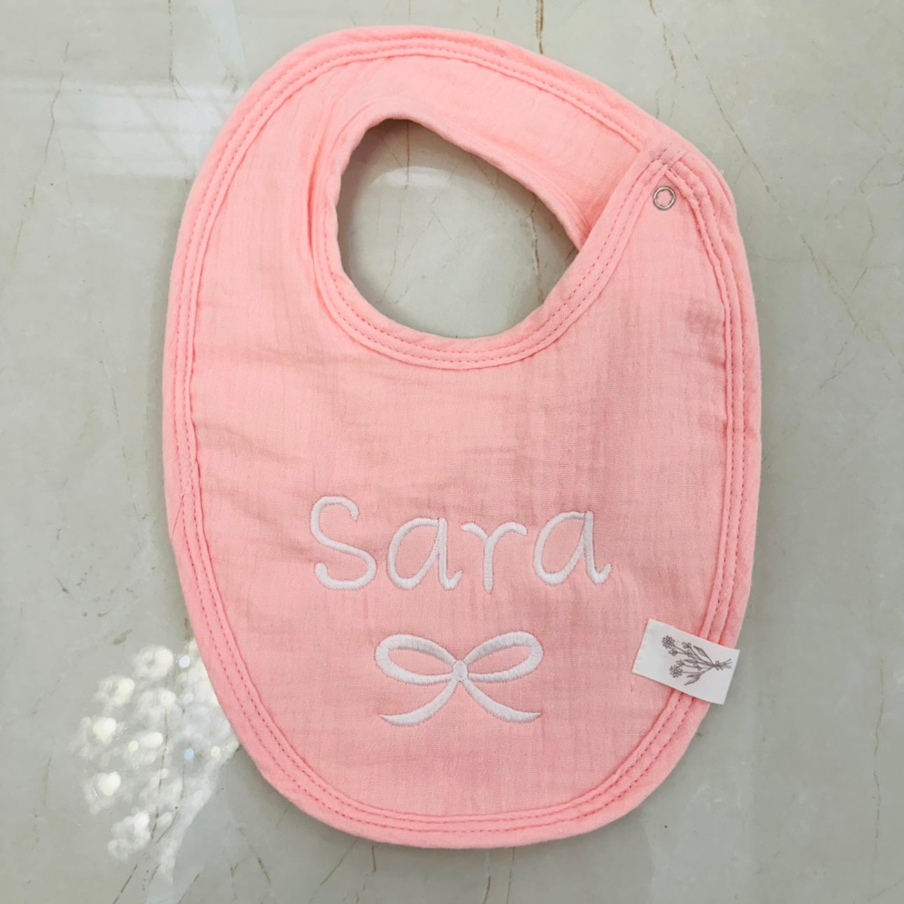 Daisy baby bib pink